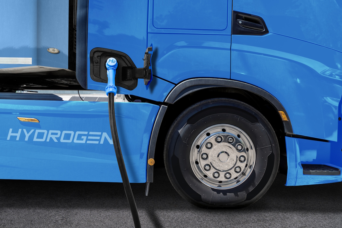 Closeup of a hydrogen truck being fueled.